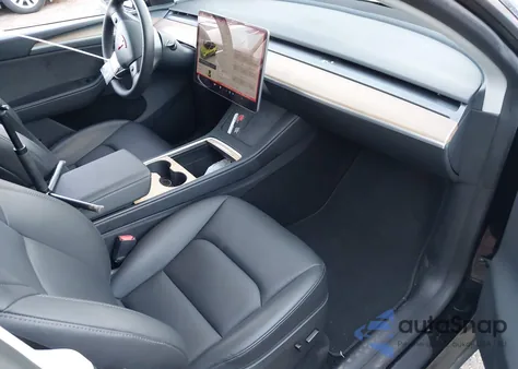 2023 Tesla Model Y Awd/Long Range Dual Motor All-Wheel Drive z USA, uszkodzony, nr VIN 7SAYGDEE3PA180998